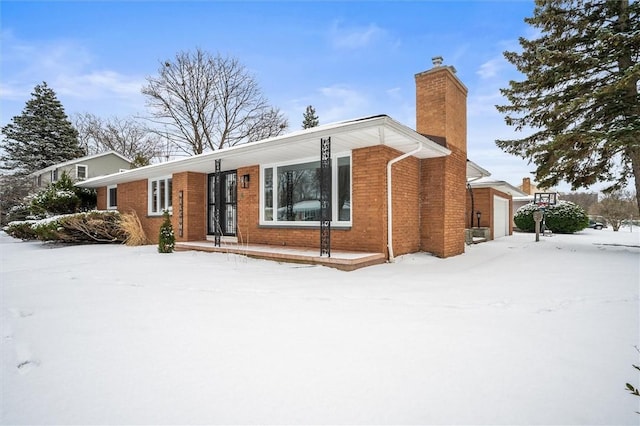 single story home with a garage