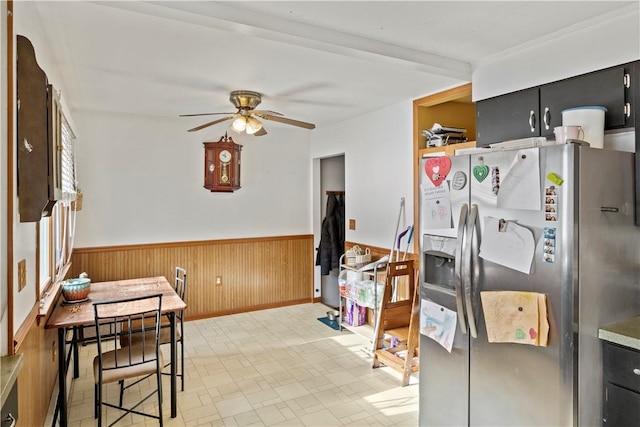 kitchen featuring ceiling fan and stainless steel fridge