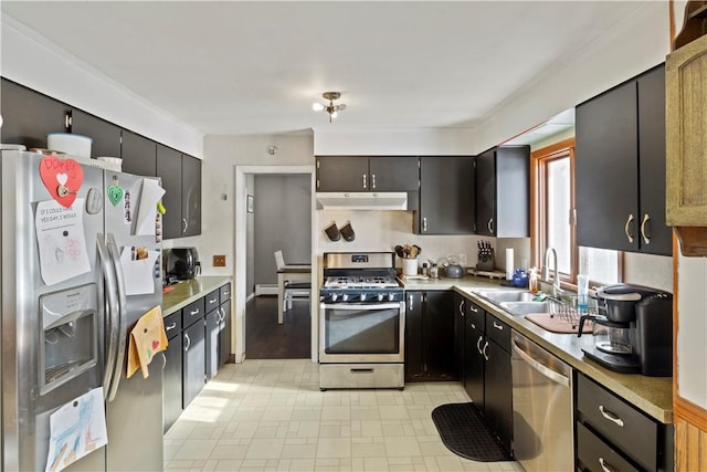 kitchen with sink and appliances with stainless steel finishes