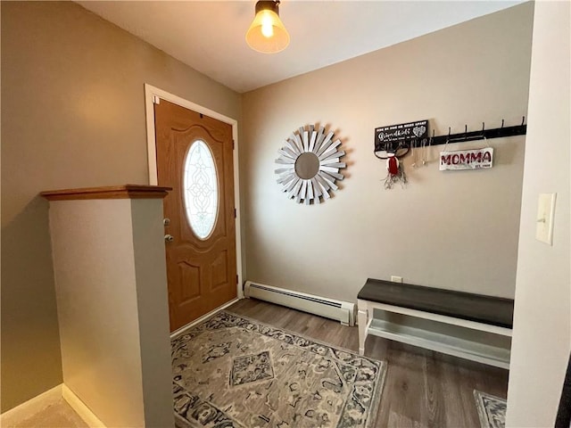 entryway with a baseboard heating unit and hardwood / wood-style floors