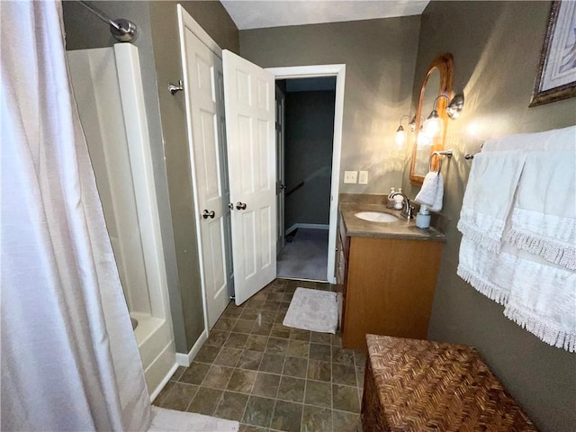 bathroom with vanity and shower / tub combo