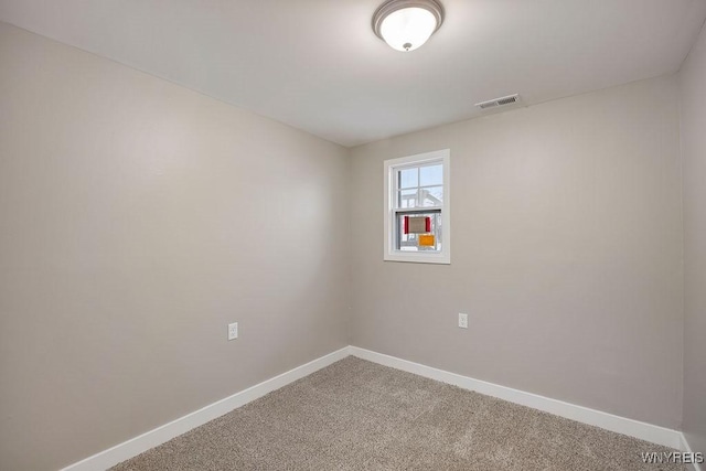 empty room featuring carpet