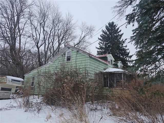 view of snow covered property