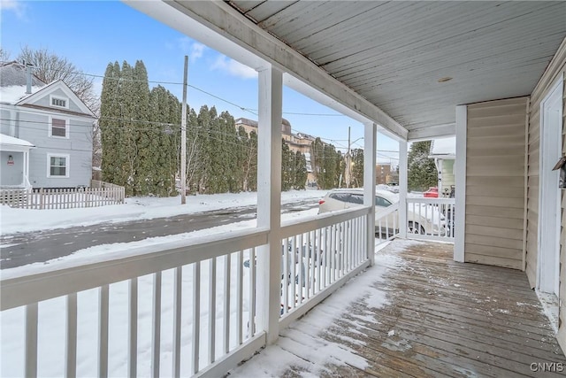 view of snow covered deck