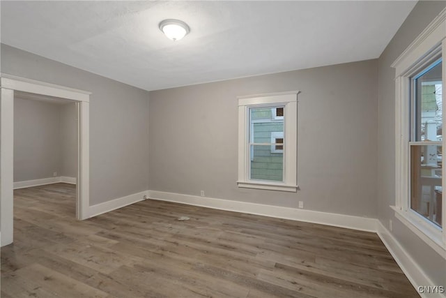 empty room featuring dark hardwood / wood-style floors