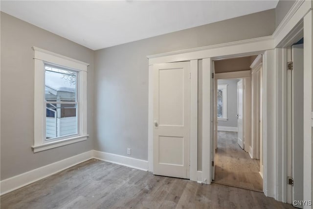 interior space with light wood-type flooring and a wealth of natural light