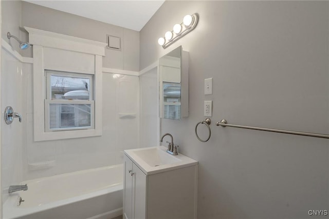 bathroom featuring shower / bathing tub combination and vanity