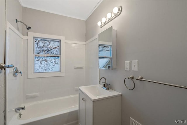 bathroom with vanity and bathing tub / shower combination