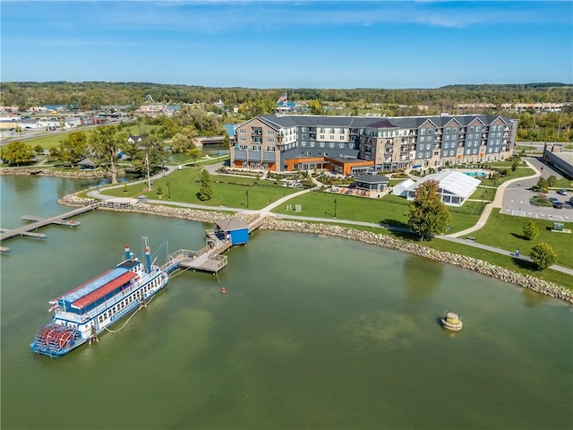 birds eye view of property with a water view