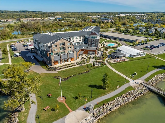 drone / aerial view with a water view