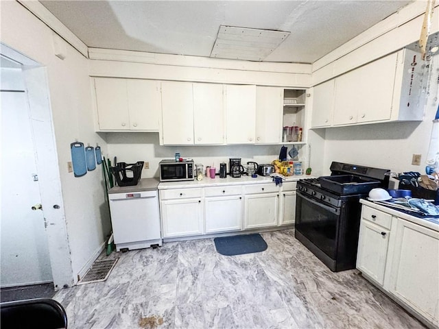 kitchen featuring white dishwasher, white cabinetry, and gas stove