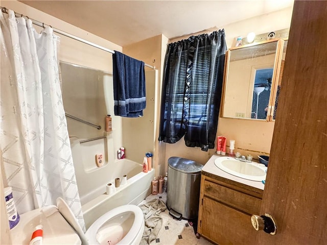 full bathroom featuring toilet, shower / bath combination with curtain, and vanity