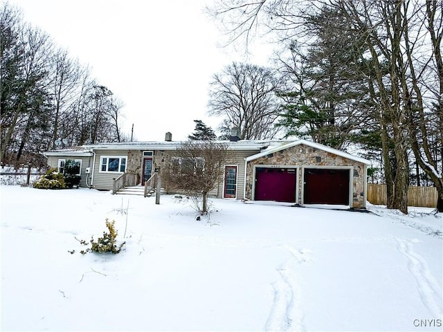 view of front of property featuring a garage