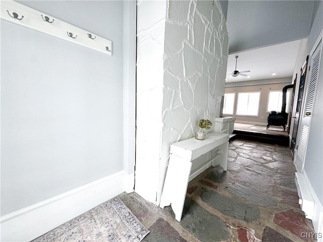 mudroom featuring ceiling fan