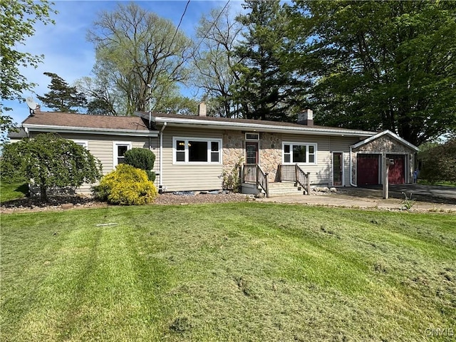 5902 N Rd, Owasco, NY 13021 - ranch-style home with a chimney, an attached garage, a front yard, and an outdoor structure