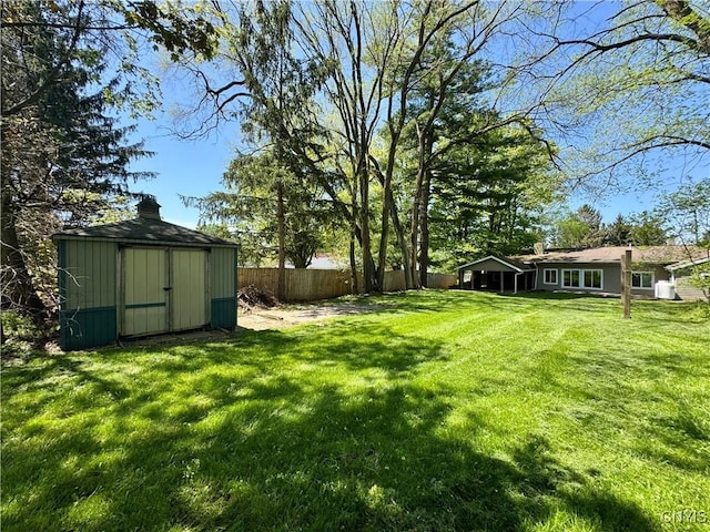 5902 N Rd, Owasco, NY 13021 - view of yard featuring a storage unit and an outdoor structure
