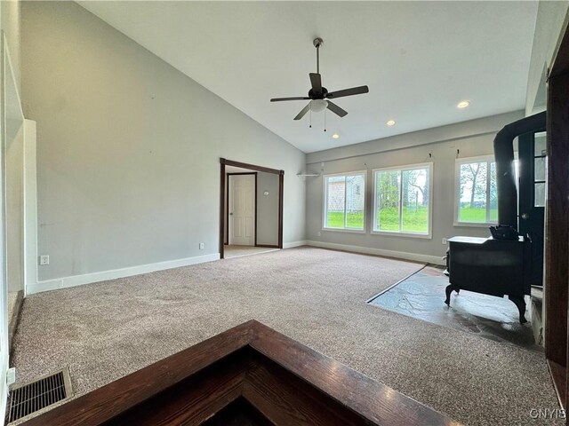 5902 N Rd, Owasco, NY 13021 - unfurnished living room featuring carpet flooring, baseboards, ceiling fan, recessed lighting, and high vaulted ceiling