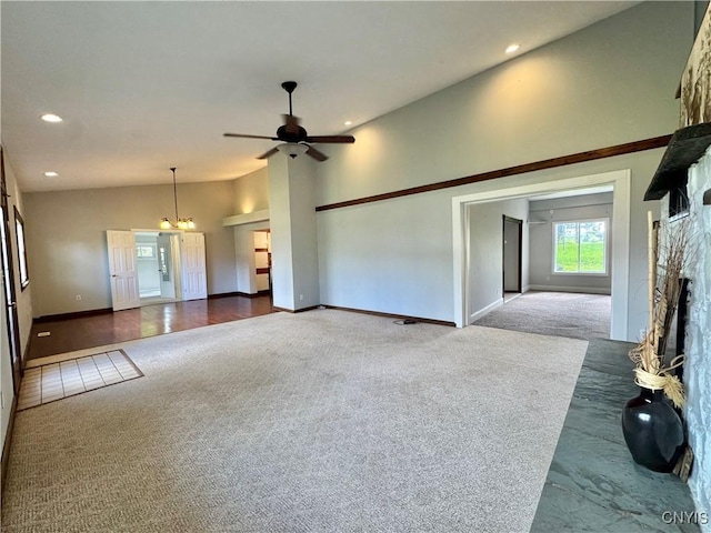5902 N Rd, Owasco, NY 13021 - unfurnished living room with lofted ceiling, carpet flooring, baseboards, ceiling fan, and recessed lighting