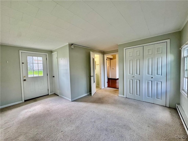 5902 N Rd, Owasco, NY 13021 - interior space with a baseboard radiator, carpet floors, baseboards, and a closet