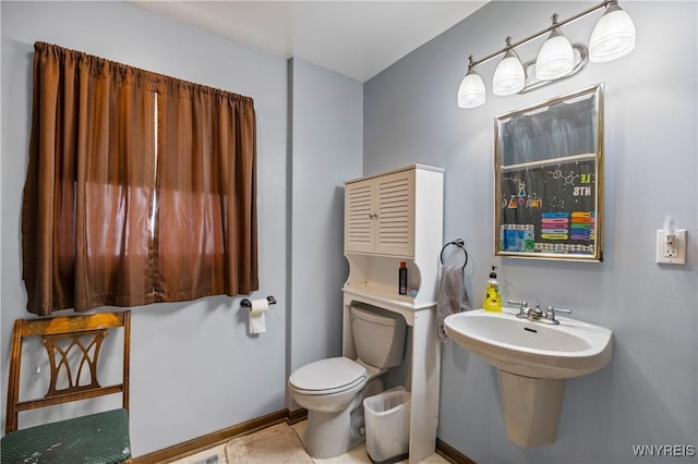 bathroom featuring toilet