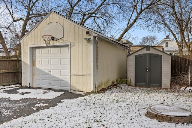 view of snow covered garage