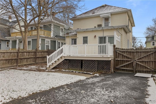 rear view of house with a deck