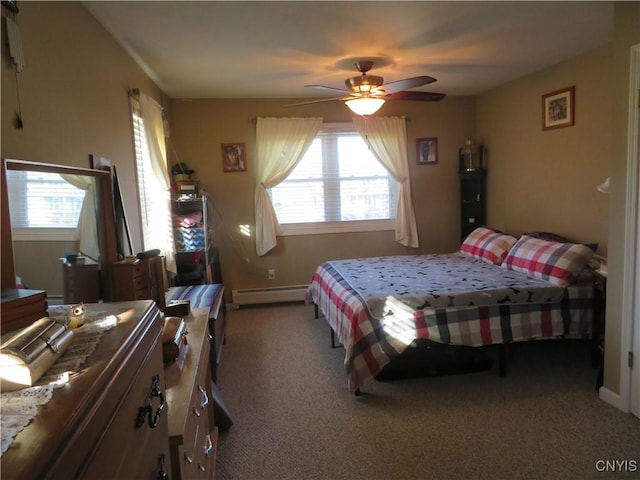 bedroom featuring ceiling fan, a baseboard radiator, and carpet floors