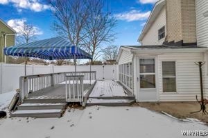 view of snow covered deck