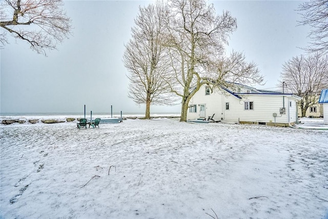 view of snow covered property