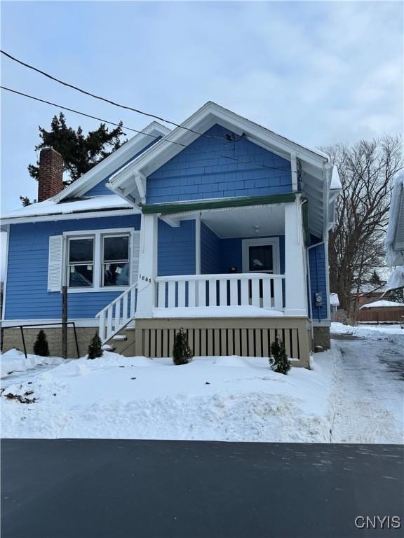 bungalow-style home featuring a porch