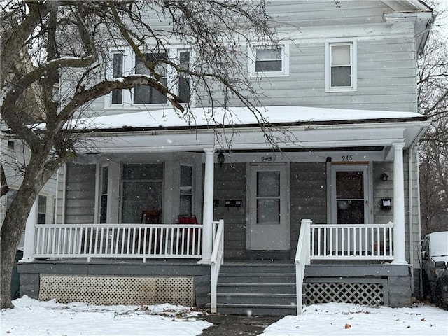 view of front of property featuring covered porch