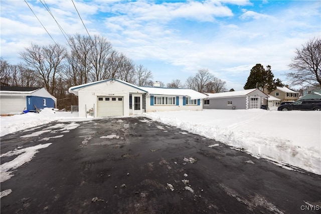 ranch-style house with a garage