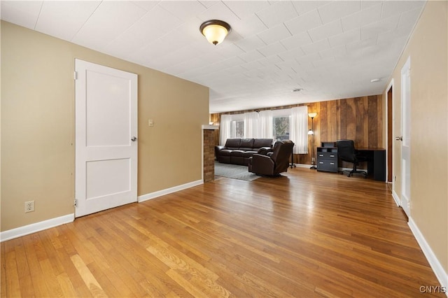 unfurnished living room featuring light hardwood / wood-style flooring