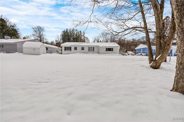 view of yard covered in snow