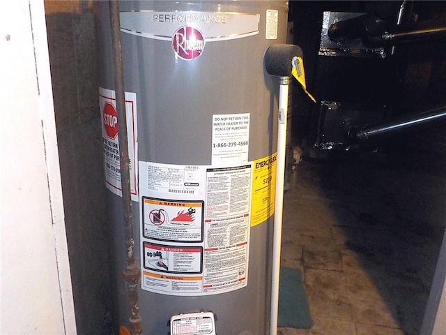 utility room with water heater