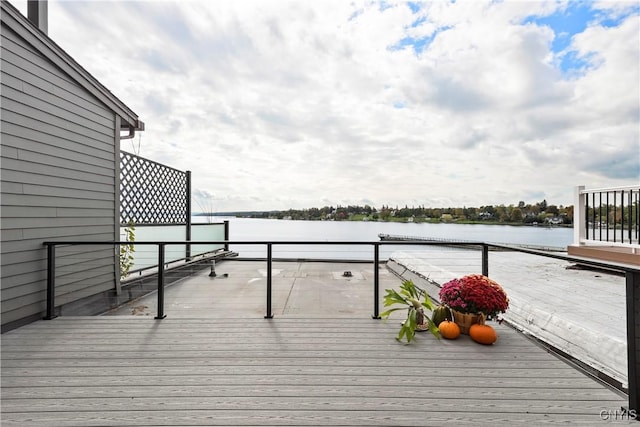 deck featuring a water view