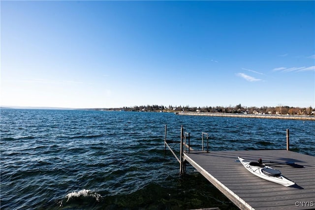 dock area featuring a water view