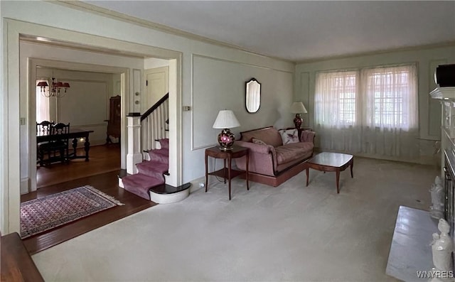 living area featuring a chandelier