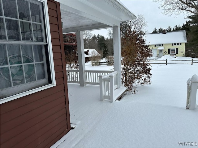 view of snow covered patio