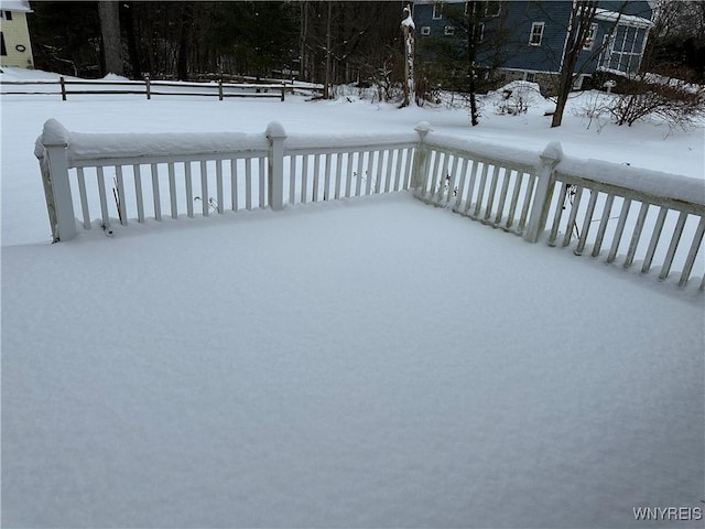 view of snow covered deck