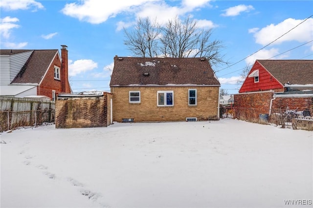 view of snow covered property