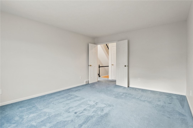 empty room featuring carpet