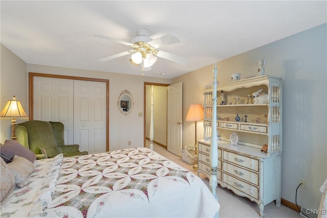 bedroom featuring ceiling fan and a closet