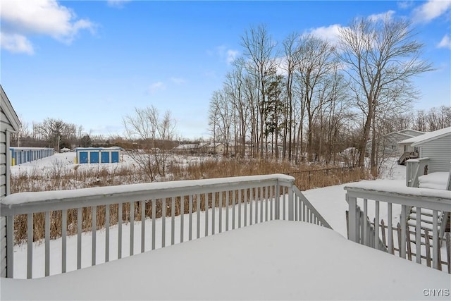 view of snow covered deck