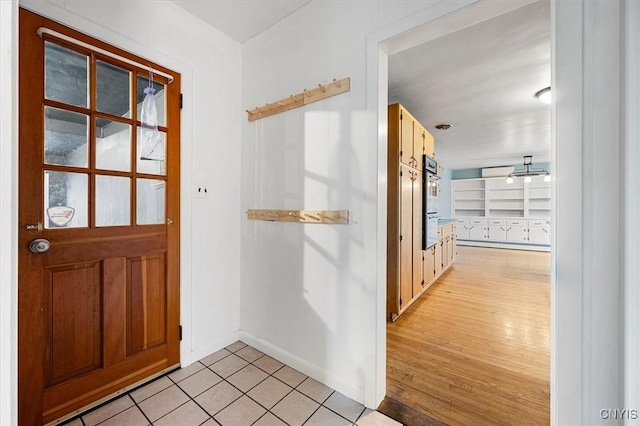 view of tiled foyer entrance