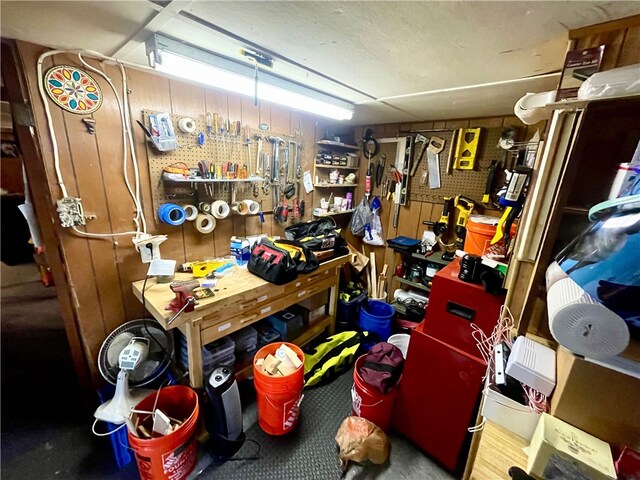 miscellaneous room with a workshop area