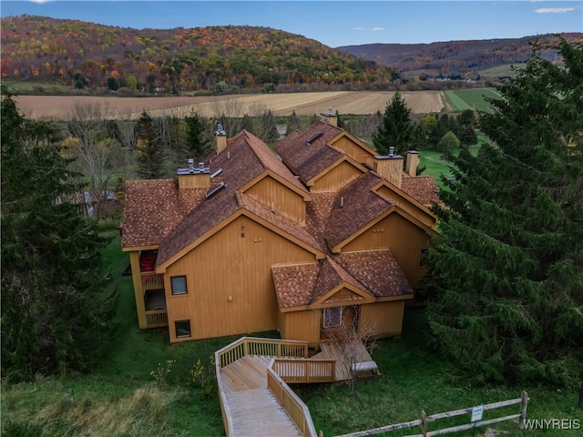 birds eye view of property featuring a mountain view