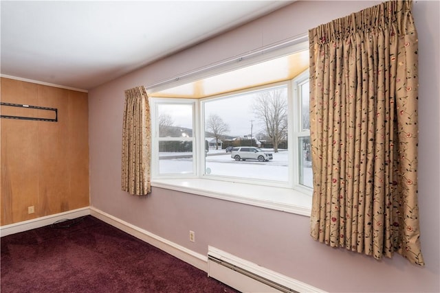 interior space with a baseboard radiator and carpet floors