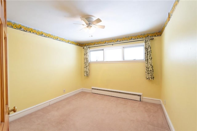 unfurnished room featuring a baseboard radiator, light carpet, ceiling fan, and crown molding