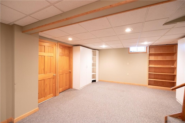 basement with carpet flooring